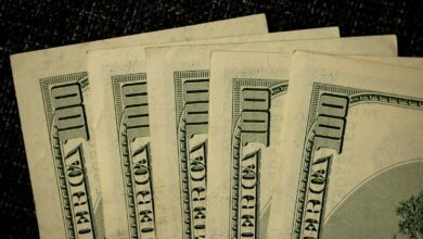 a close up of a bunch of money on a table