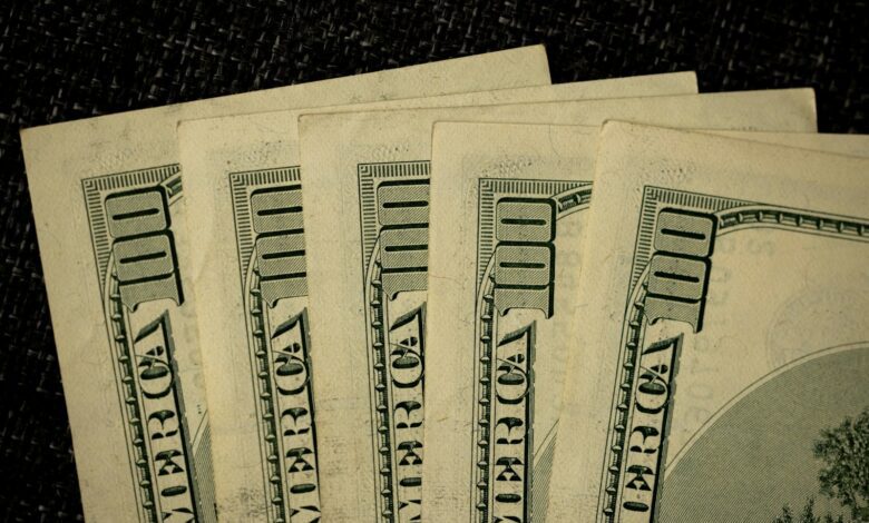 a close up of a bunch of money on a table