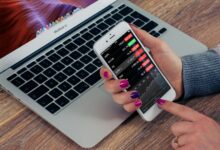 person holding silver iphone 6