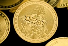 a close up of a pile of gold coins