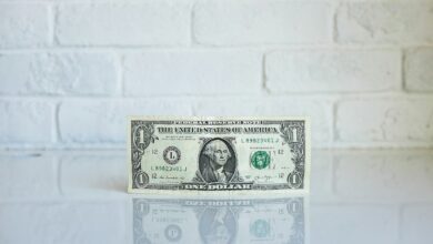 1 u.s. dollar banknote on white surface