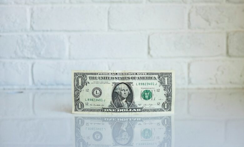 1 u.s. dollar banknote on white surface