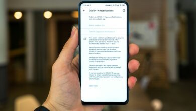 person holding black iphone 7