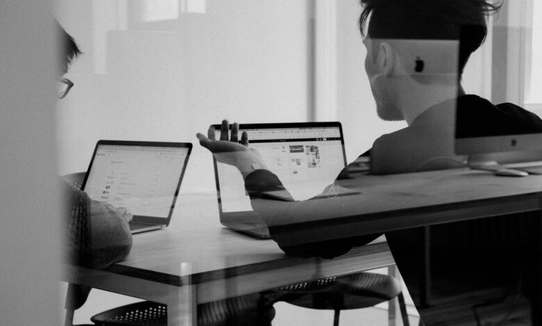 man using macbook
