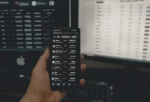 person holding black android smartphone