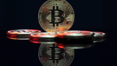 a bit coin sitting on top of a table