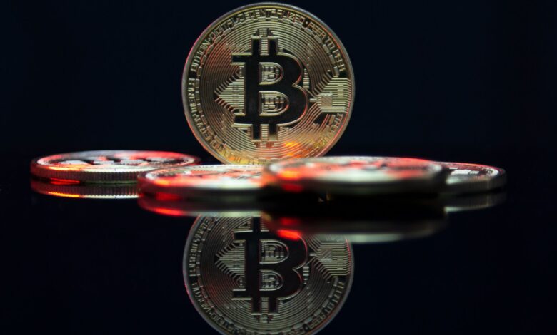 a bit coin sitting on top of a table