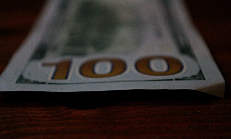 a close up of a hundred dollar bill