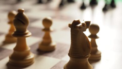 brown chess piece on chess board