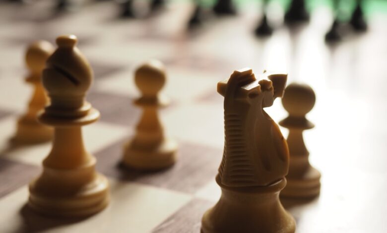 brown chess piece on chess board
